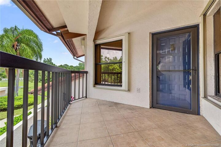 Property Photo:  3410 SE Martinique Trace 201  FL 34997 