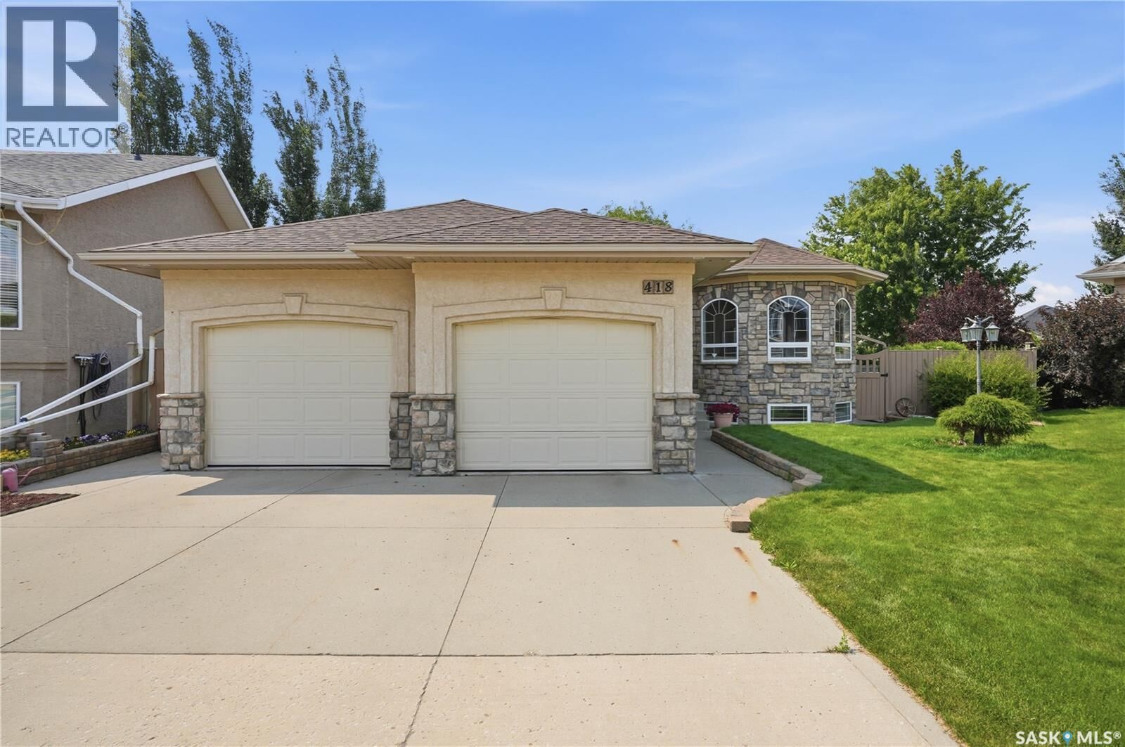 Property Photo: 418 Bourgonje Court SK S7S 1L7