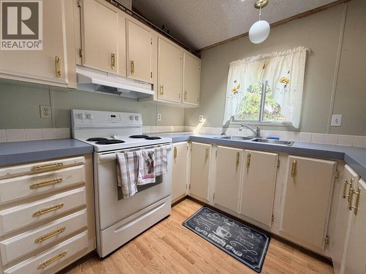 Property Photo:  2155 Commodore Crescent 10  BC V2G 5E1 