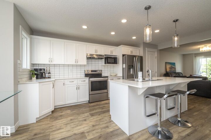 Property Photo: 803 Secord Boulevard NW AB T5T 7K2