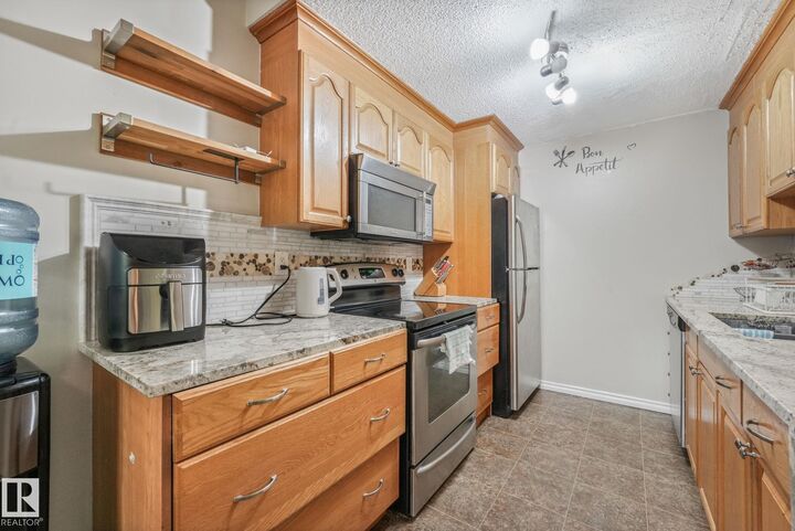 Property Photo: 203B Homestead Crescent NW AB T5A 2Y2