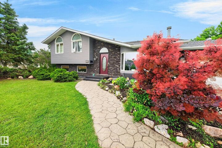 Property Photo: 13204 47 Street NW AB T5A 3P6