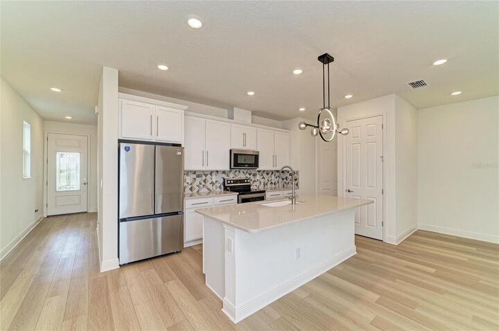 Property Photo: 10455 Wet Marsh Cove FL 34219