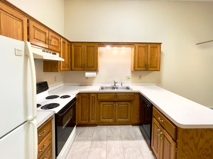 Property Photo: 2000 108th Lane NW 203 MN 55433
