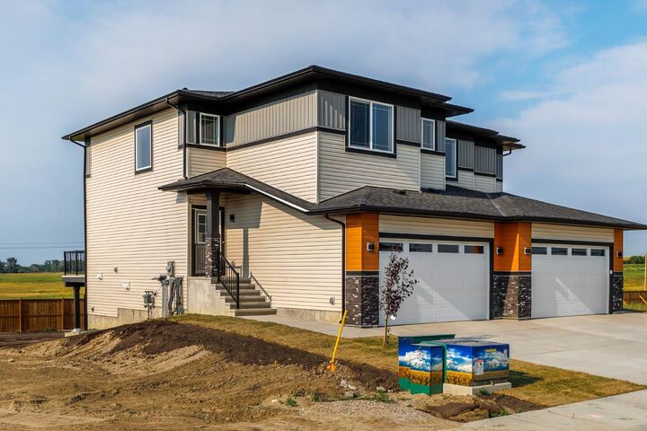 Property Photo: 142 Lakewood Crescent AB T1P 0G6