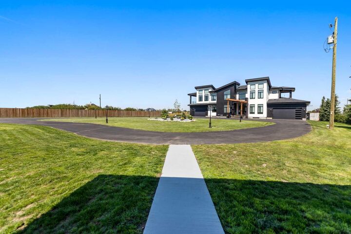 Property Photo: 241 A Township Road 280148 AB T1X 0M5