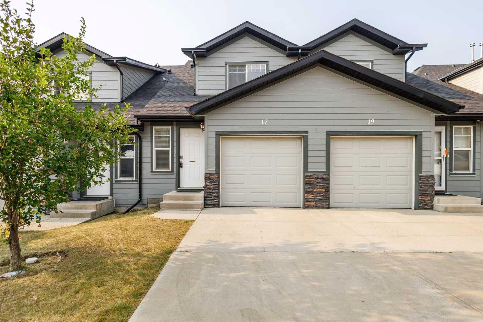 Property Photo: 17 Panatella Villas NW AB T3K 0G7
