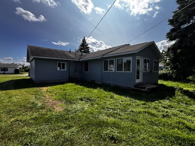 Property Photo:  116 Byron Street  MI 49721 