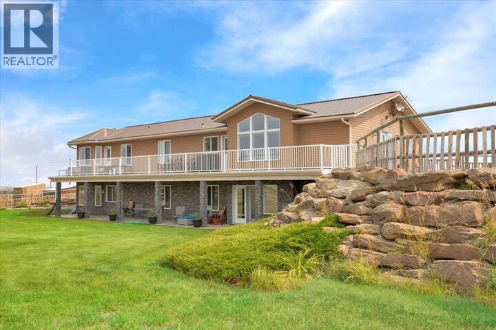 Property Photo: 562056 24 Street East AB T1V 1N2