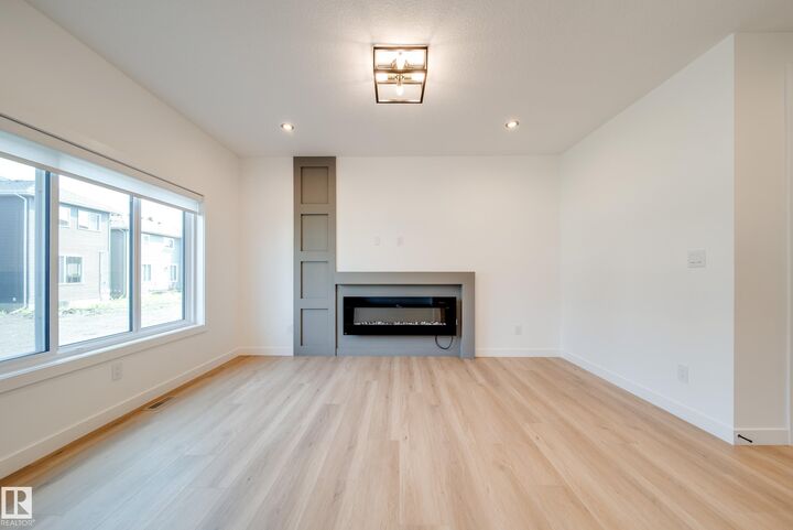 Property Photo: 10 Blackbird Bend AB T8L 0G6