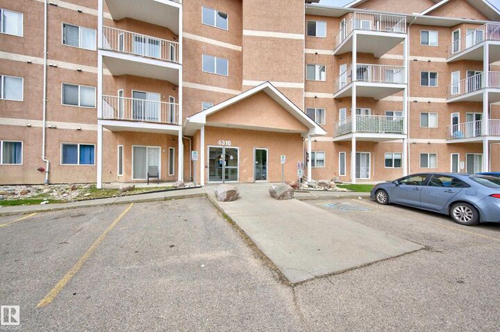 Property Photo: 4316 139 Avenue NW 211 AB T5Y 0L1