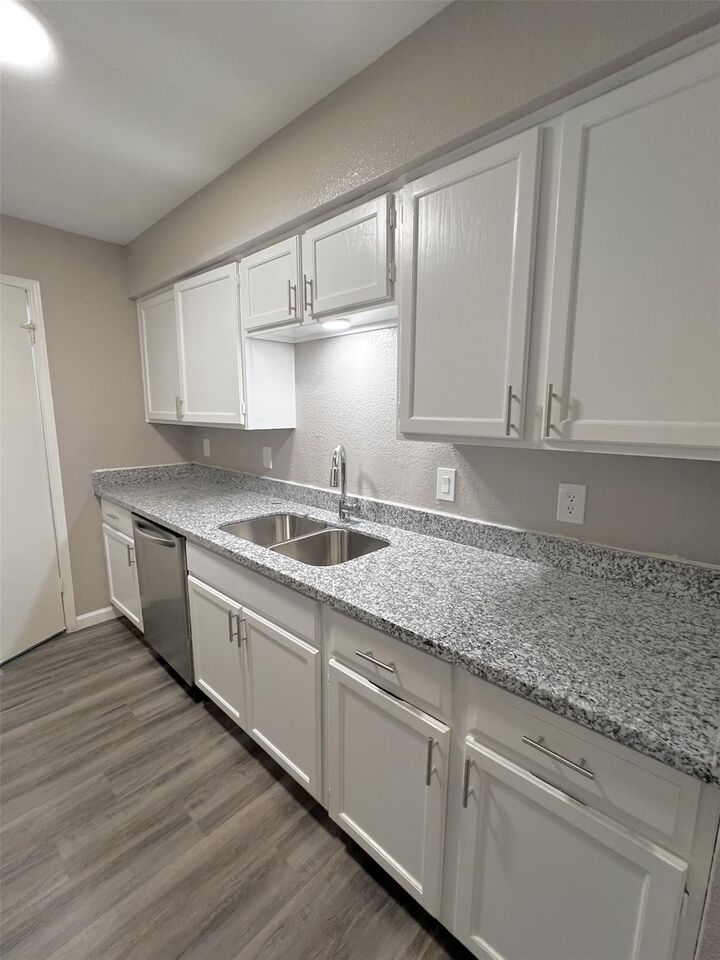 Property Photo:  9700 Leawood Boulevard 7/16  TX 77099 