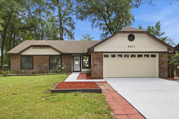 Property Photo: 5513 Caurus Court FL 32808