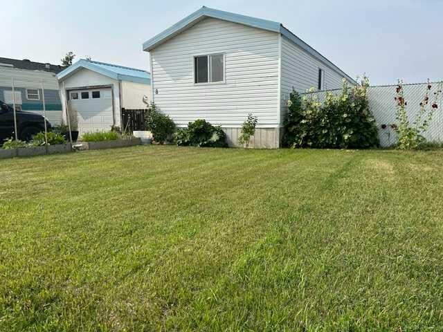Property Photo: 8 Meadowlake Gate E AB T1R 1E9