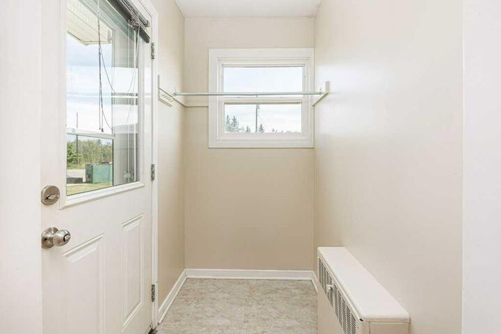 Property Photo: 22 Poplar Crescent AB T4S 1V3