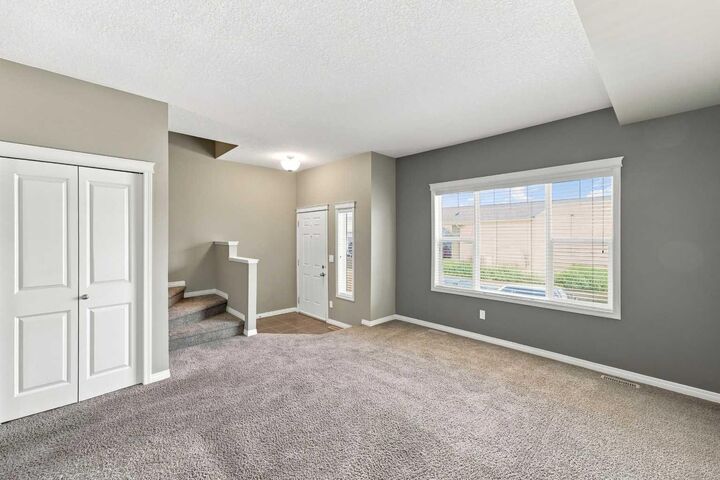 Property Photo: 50 Lucky Place 115 AB T4S 0E3