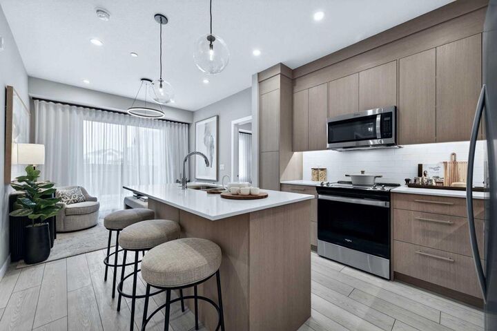 Property Photo: 265 Wolf Willow Boulevard SE 2304 AB T2X 6P9