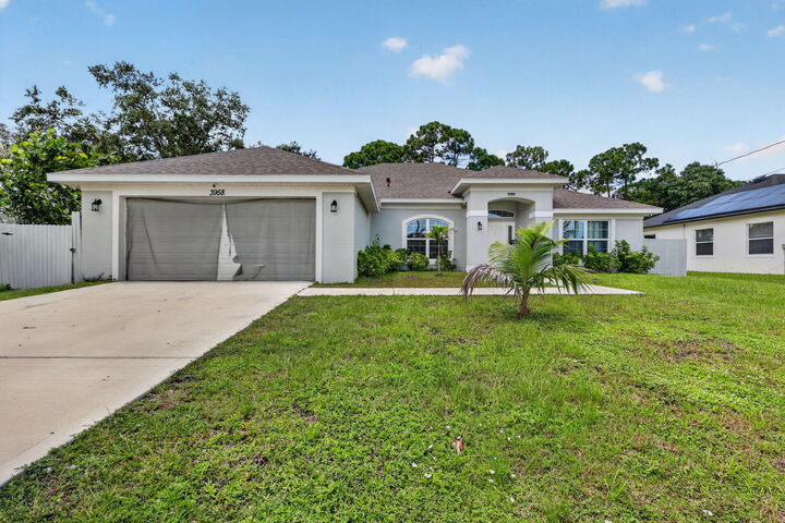 Property Photo: 3958 SW Brunswick Street FL 34953