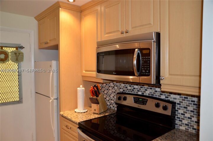 Property Photo:  17050 NE 14th Ave 115  FL 33162 