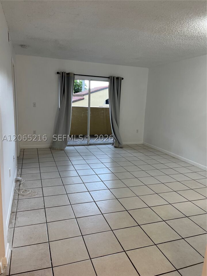 Property Photo:  14930 SW 82nd Ter 16-205  FL 33193 