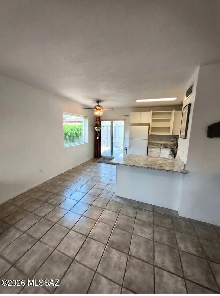 Property Photo:  211 W Roger Road 23  AZ 85705 