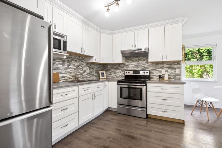Property Photo: 1122 King Albert Avenue 105 BC V3J 1X7