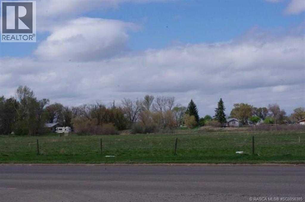 Property Photo:  710 Cassils Road West  AB T1R 1H7 