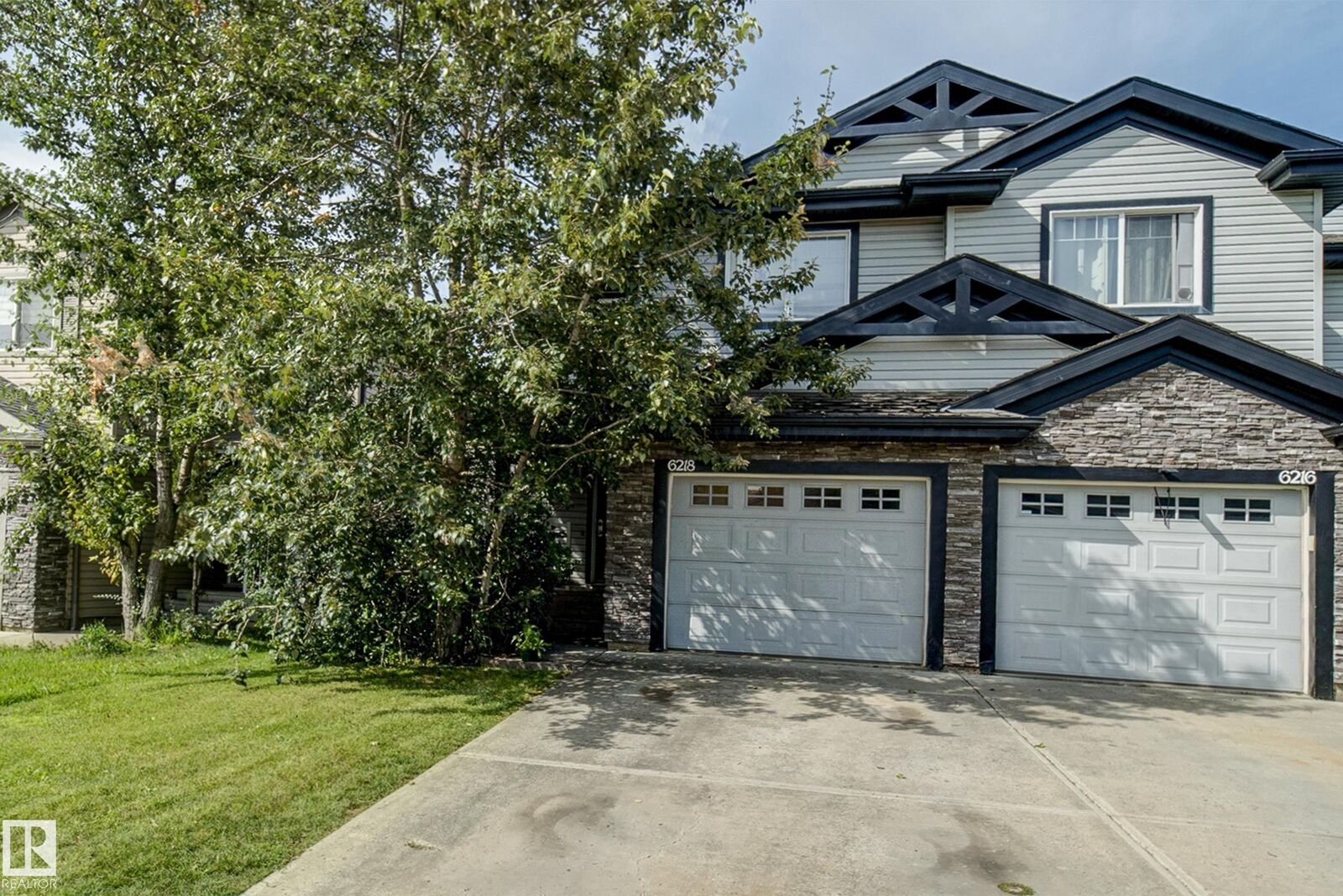 Property Photo:  6218 1A Avenue SW  AB T6X 0C1 