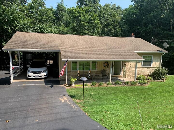 Property Photo: 1223 W Cape Rock Drive MO 63701