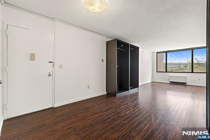 Property Photo: 45 River Drive 415 NJ 07310
