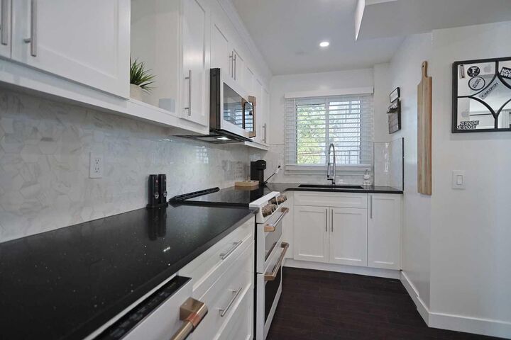 Property Photo: 310 Falconridge Crescent NE 205 AB T3J 1H4