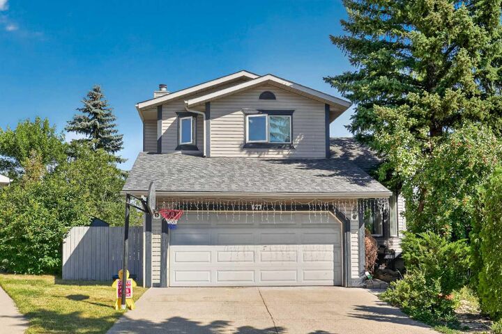 Property Photo:  627 Macewan Valley Road NW  AB T3K 3T3 