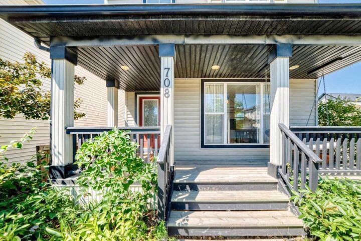 Property Photo: 708 Tuscany Drive NW AB T3L 3A7