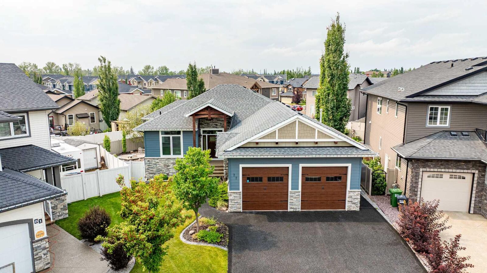 Property Photo: 77 Grove Close AB T4P 0P4