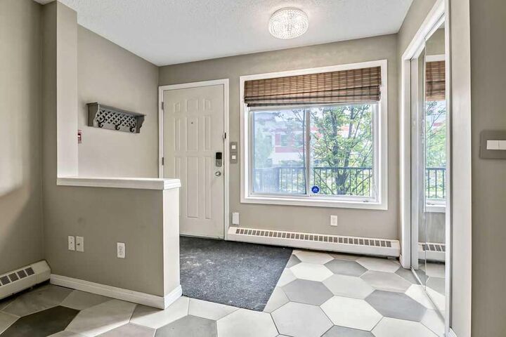 Property Photo:  21 McKenzie Towne Gate SE 2  AB T2Z 0C5 