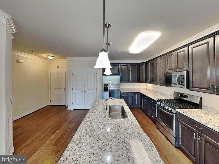 Property Photo:  13723 Neil Armstrong Avenue 205  VA 20171 