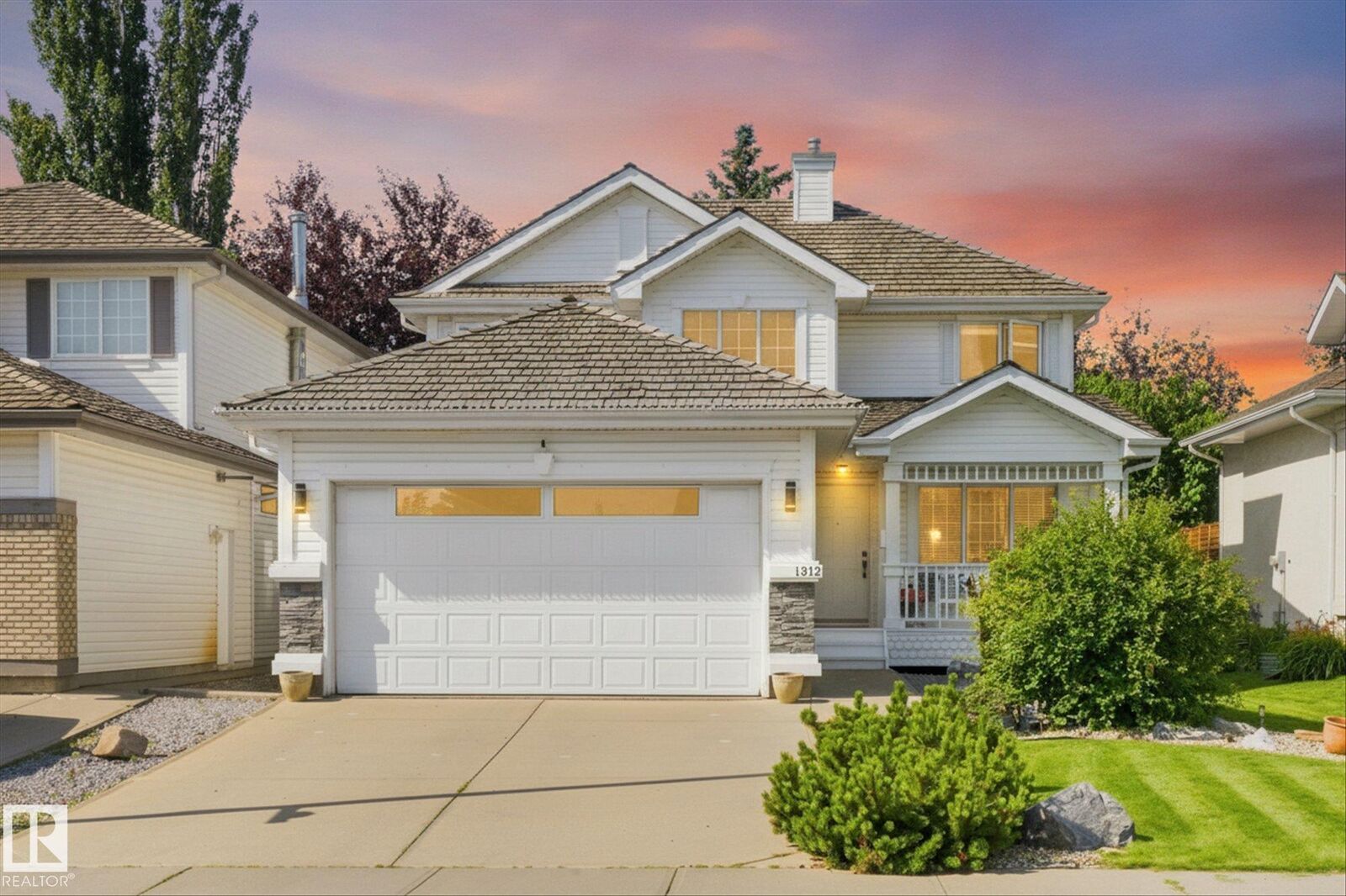 Property Photo: 1312 116 Street NW AB T6J 7B3