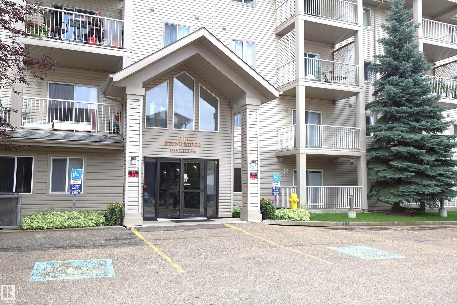 Property Photo: 12550 140 Avenue NW 415 AB T5X 6J4