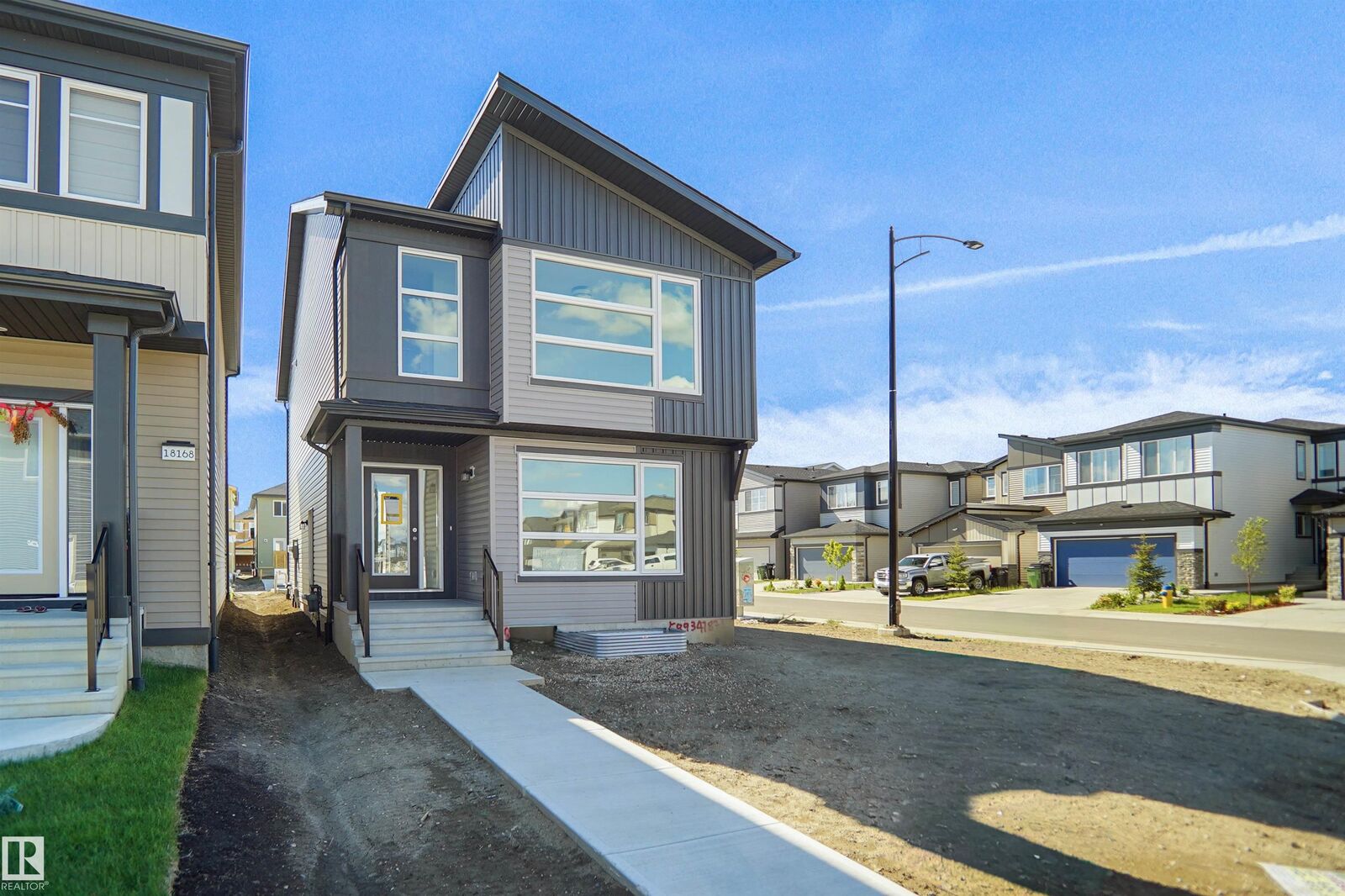 Property Photo: 21208 25 Avenue NW AB T6M 2N6