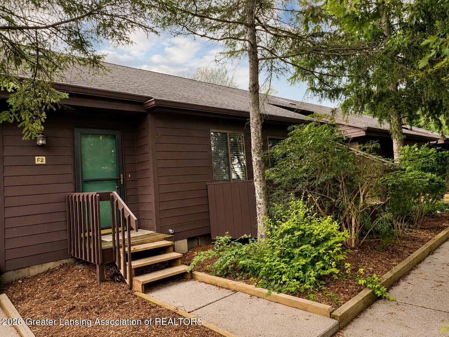 Property Photo:  225 E Jolly Road  MI 48910 