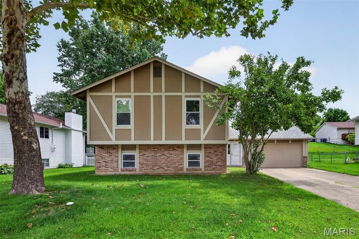 Property Photo:  1719 Foxglove Drive  MO 63303 