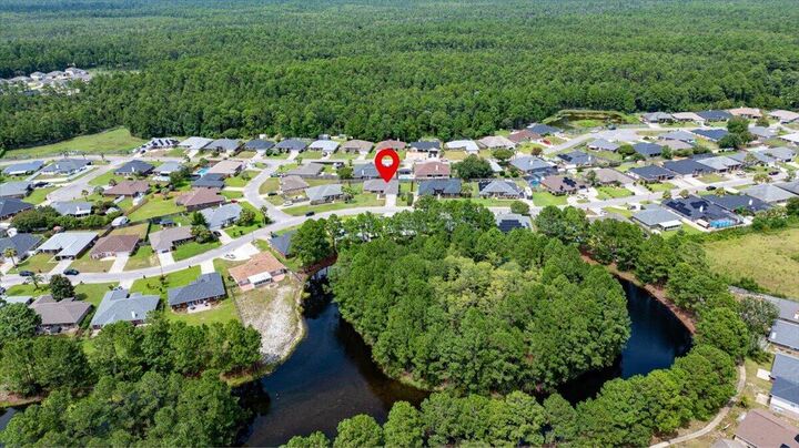 Property Photo:  9939 Parker Lake Circle  FL 32566 