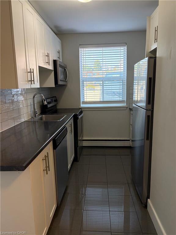 Property Photo: 2 Grant Boulevard 3 ON L9H 4N9