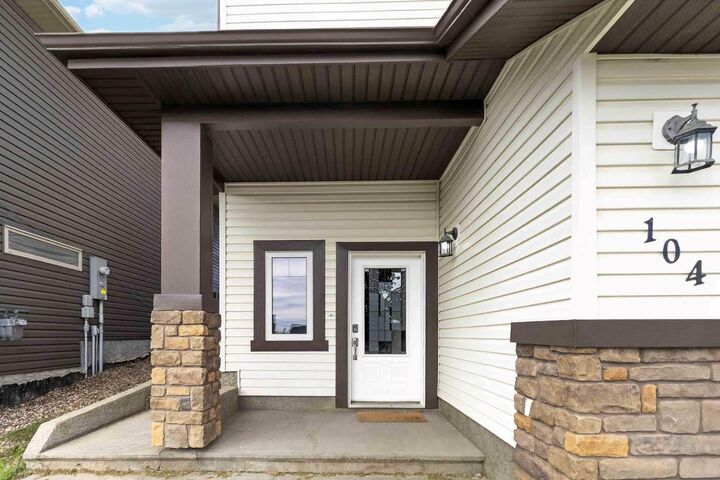 Property Photo: 104 Killdeer Way AB T9K 0P8