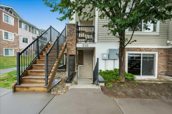 Property Photo: 300 Marina Drive 210 AB T1X 0P6