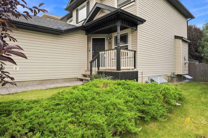 Property Photo: 50 Somerglen Park SW AB T2Y 3M5