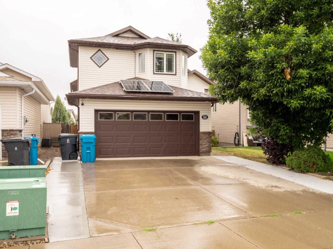 Property Photo: 34 Heritage Green W AB T1K 7Z7