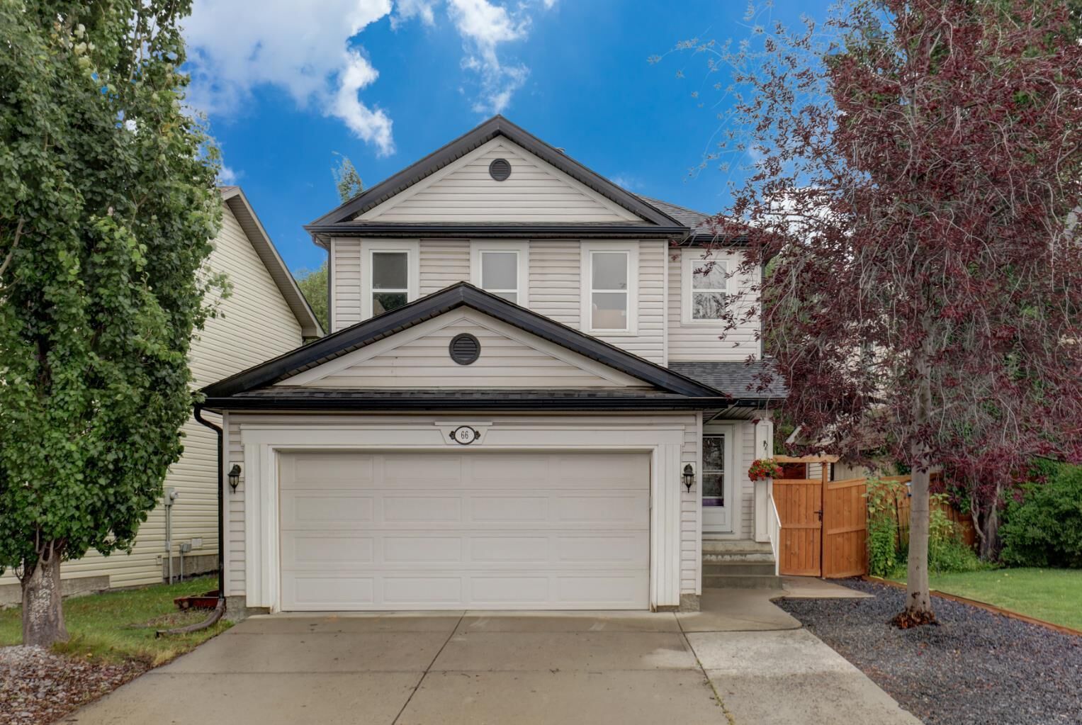 Property Photo: 66 Copperfield Close SE AB T2Z 4L2