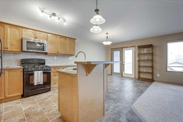 Property Photo:  44 Osler Crescent  AB T4P 4E8 