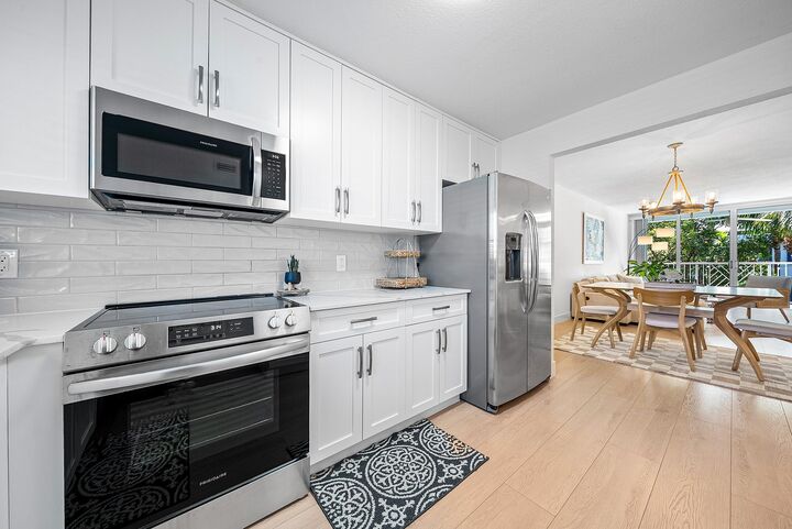 Property Photo:  621 E Woolbright Road B407  FL 33435 